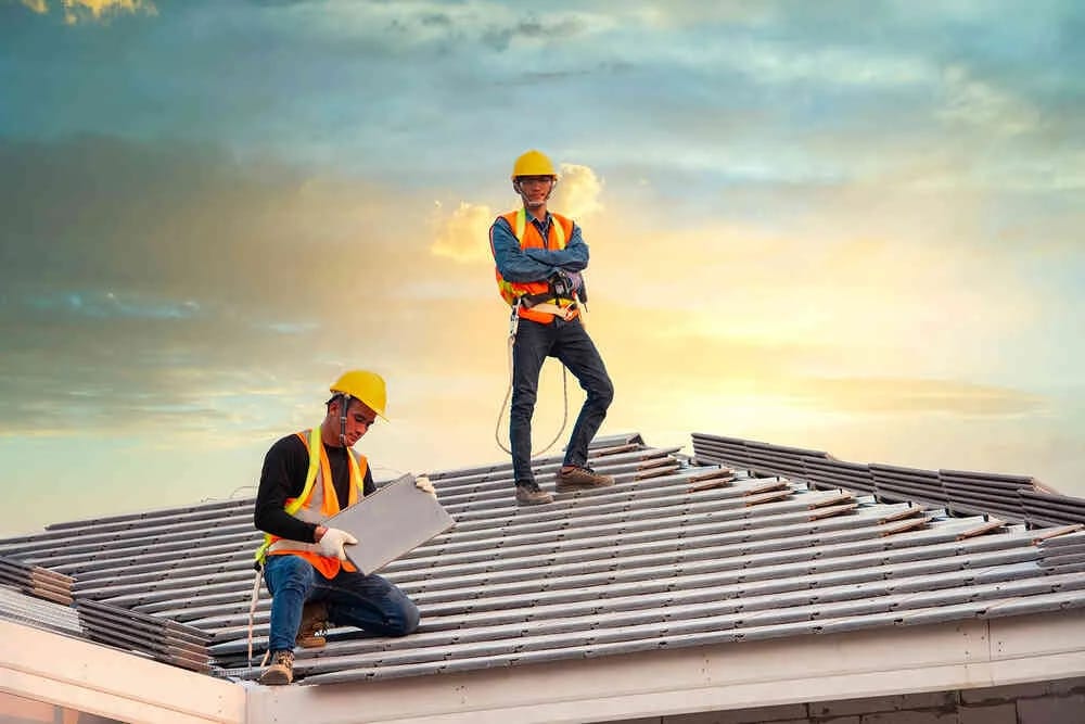 Roofing Contractor on top of the roof